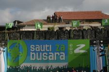 Guys climb on roof for festival Busara 2008